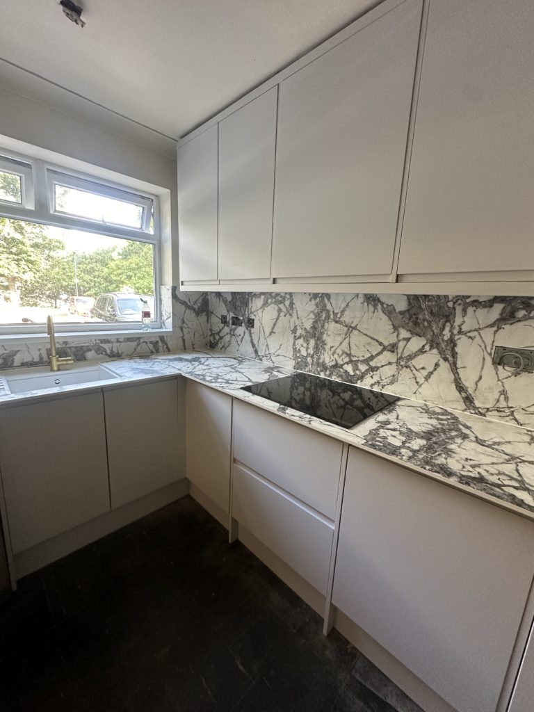 Fitted kitchen with wall units and worktops installed in Norwich
